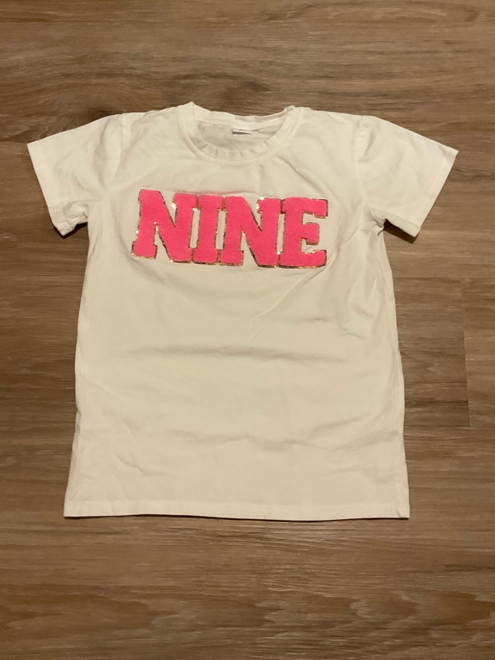Kids White Tee with Pink 'NINE' Graphic